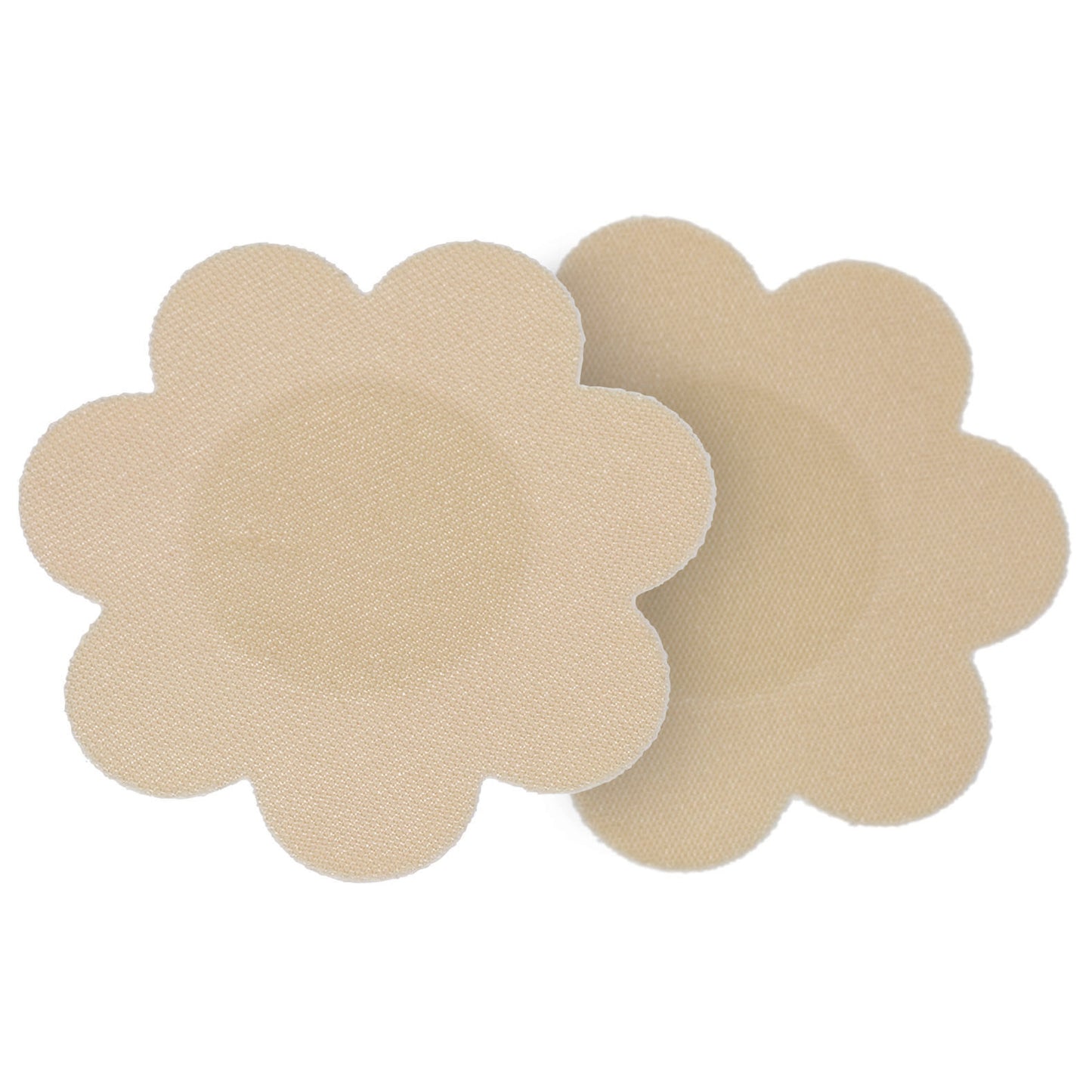 close up product image of the extreme silicone breast petals. They are nude in color, have a smooth texture and a soft center for nipple coverage.