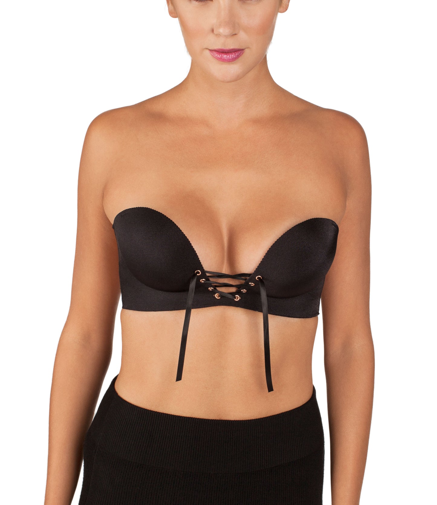 Model wearing the black Lace Up Push Up Adhesive Bra. The string is untied, showing that you can customize your cleavage depending on how tight you tie the string.